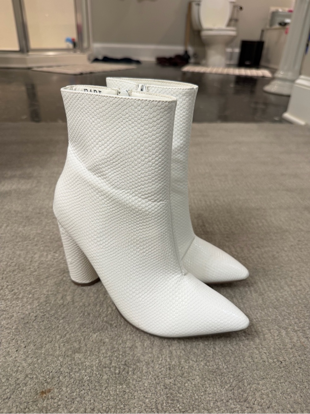 White Textured Pointed-Toe Ankle Boots - Women